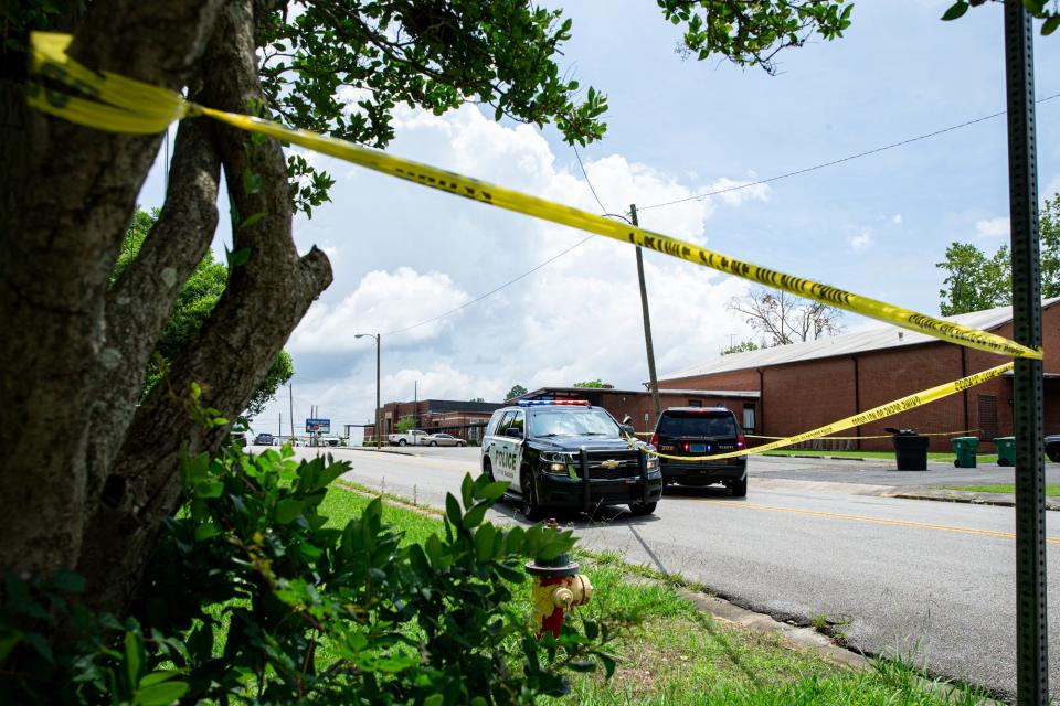 Law enforcement personnel were on the scene Thursday of an officer-involved shooting outside Walnut Park Elementary School in Gadsden. A man seen trying to get into the school scuffled with an SEO, and was fatally shot during the incident after backup arrived.