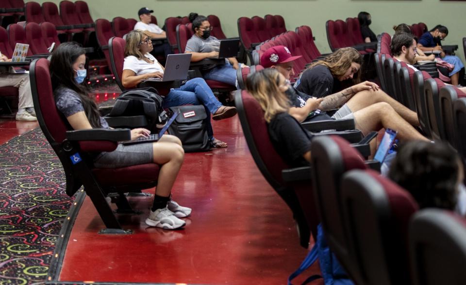 College students attend a Criminology class inside a movie theater about a mile from the UC Riverside campus.