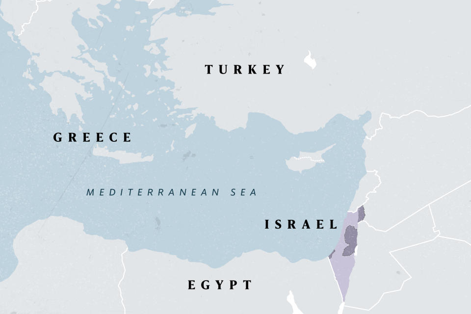 Israel with Gaza, the West Bank and the Golan Heights highlighted in dark purple. (Yahoo)