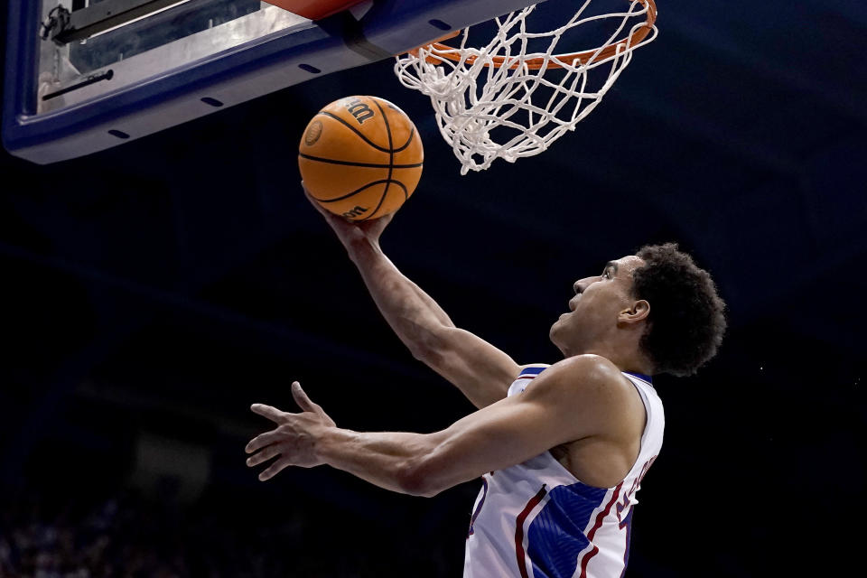 Kansas guard Kevin McCullar Jr. shoots during the first half of an NCAA college basketball game against Oklahoma Tuesday, Jan. 10, 2023, in Lawrence, Kan. (AP Photo/Charlie Riedel)