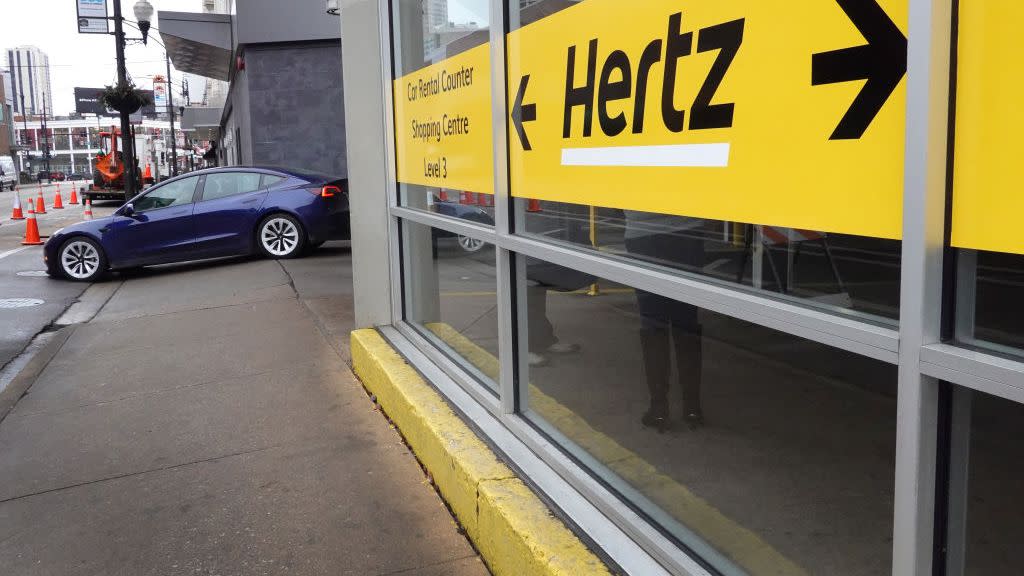 hertz rental car company reports quarterly revenue growth and posts profit