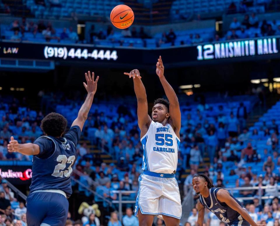 North Carolina’s Harrison Ingram (55) shoots over St. Augustine’s Jalen Williams (23) in the first half on Friday, October 27, 2023 at the Smith Center in Chapel Hill, N.C.