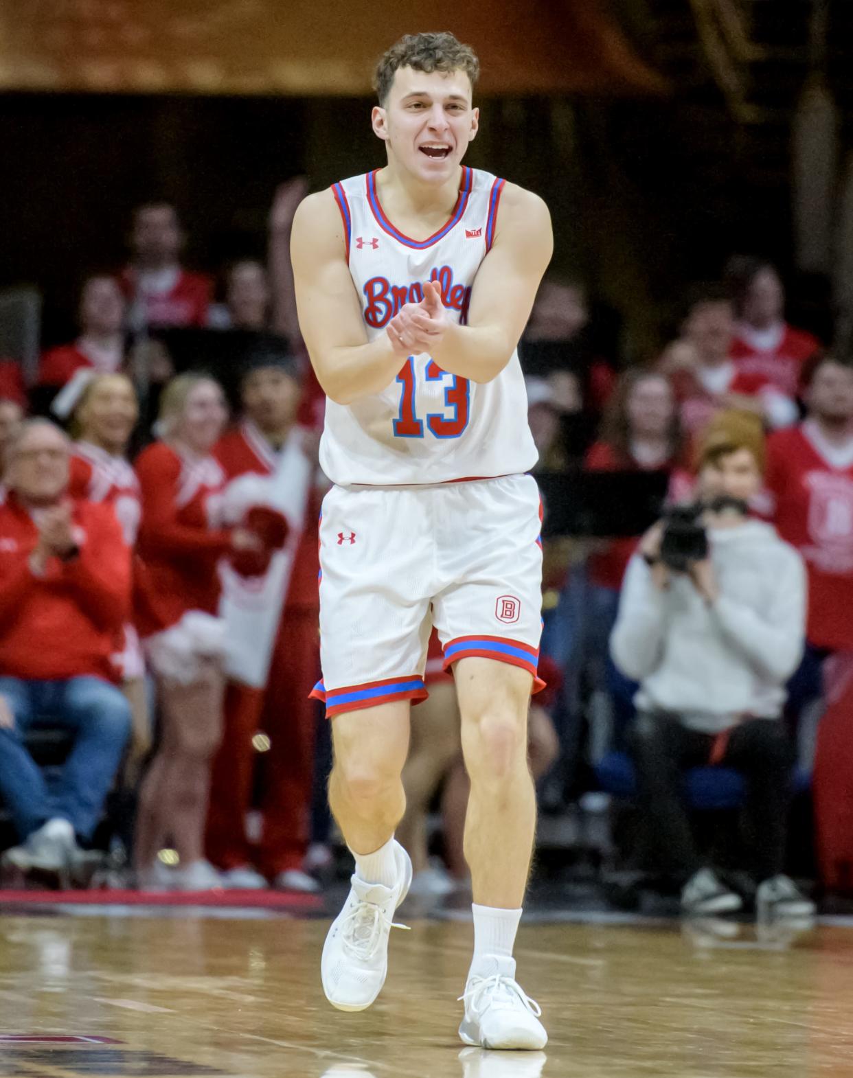 Bradley's Sam Hennessy celebrates his three-pointer against Murray State in the second half Saturday, Feb. 11, 2023 at Carver Arena. The Braves rolled over the Racers 83-48.
