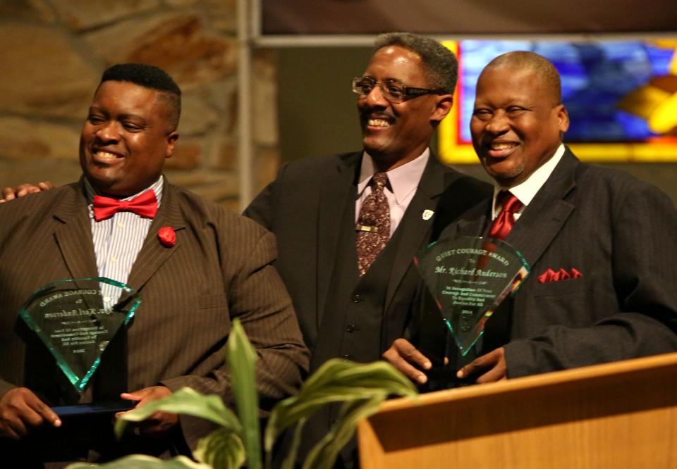 Nominations will be accepted through Nov. 4 for the 2022 Rosa Parks Quiet Courage Award presented by the Rosa Parks Quiet Courage Committee. This photo pictures, from left, Pastor Karl "The Rev." Anderson of Upper Room Ministries, the Rev. Milford Griner, founder and president of the RPQCC, and Richard Anderson, an executive with Meridian Behavioral Healthcare, as the Andersons accept the 2014 Quiet Courage Award for being the primary organizers of the annual Stop The Violence/Back to School Rally. (File photo by Brad McClenny/Special to The Guardian).