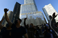 Supporters of President-elect Joe Biden celebrate outside Trump Tower Saturday, Nov. 7, 2020, in Chicago. (AP Photo/Paul Beaty)