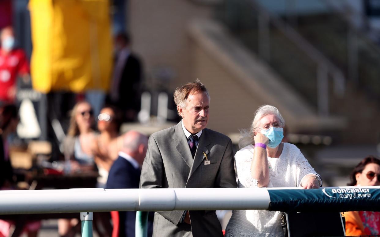 Racegoers in attendance as a pilot scheme for the return of crowds to sporting events is expected to bring in 2500 spectators during  - David Davies - Pool/Getty Images