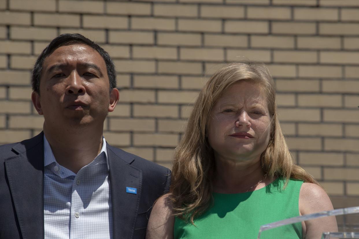 New York City mayoral candidates Andrew Yang and Kathryn Garcia attend the unveiling of a mural in Chinatown on Sunday, June 20, in New York City. Yang and Garcia are campaigning together in the lead-up to primary Election Day on June 22. 