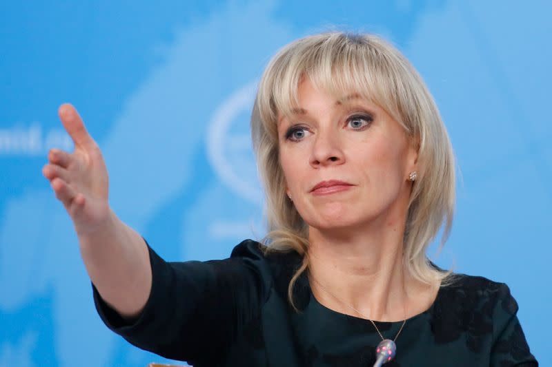 Russia's Foreign Ministry spokeswoman Zakharova reacts during the annual news conference in Moscow