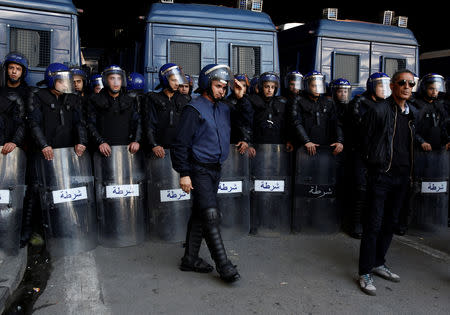 Police officers stand by during anti government protests in Algiers, Algeria April 26, 2019. REUTERS/Ramzi Boudina