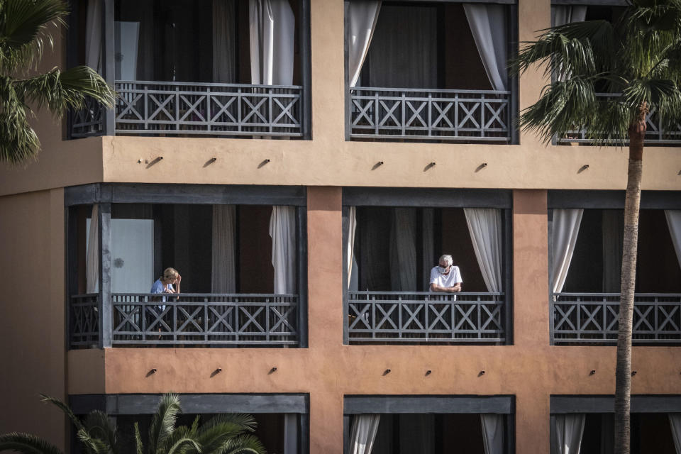 The hotel H10 Costa Adeje Palace, which has been quarantined because of coronavirus cases, continues to be cordoned off by the police on Feb. 27 in Santa Cruz de Tenerife, Spain. | Arturo Rodriguez—picture-alliance/dpa/AP