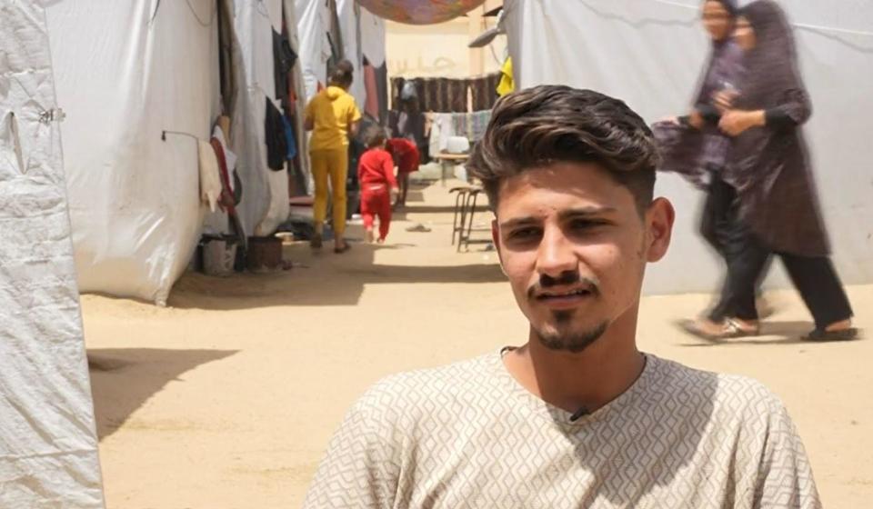 Essam el-Demasy, who told CBS News he was on the verge of earning a business degree at the Islamic University of Gaza before the war, speaks with CBS News at a camp for displaced Palestinians in southern Gaza, April 24, 2024. / Credit: CBS News