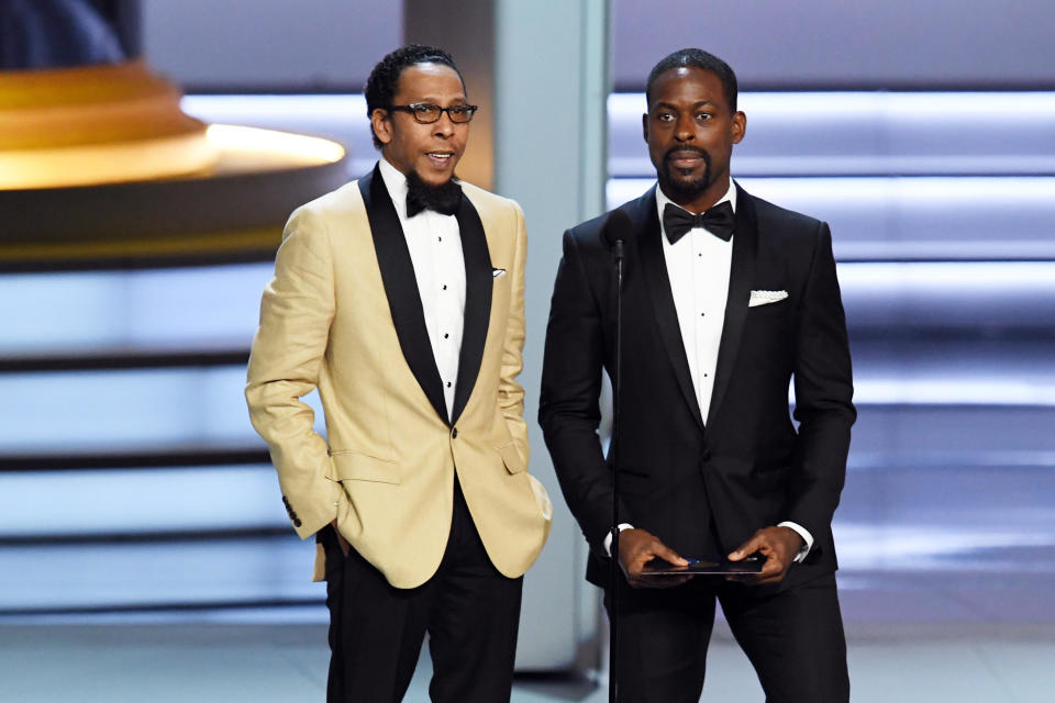 Ron Cephas Jones and Sterling K. Brown speak onstage during the 70th Emmy Awards at Microsoft Theater on September 17, 2018 in Los Angeles, California. / Credit: Kevin Winter / Getty Images