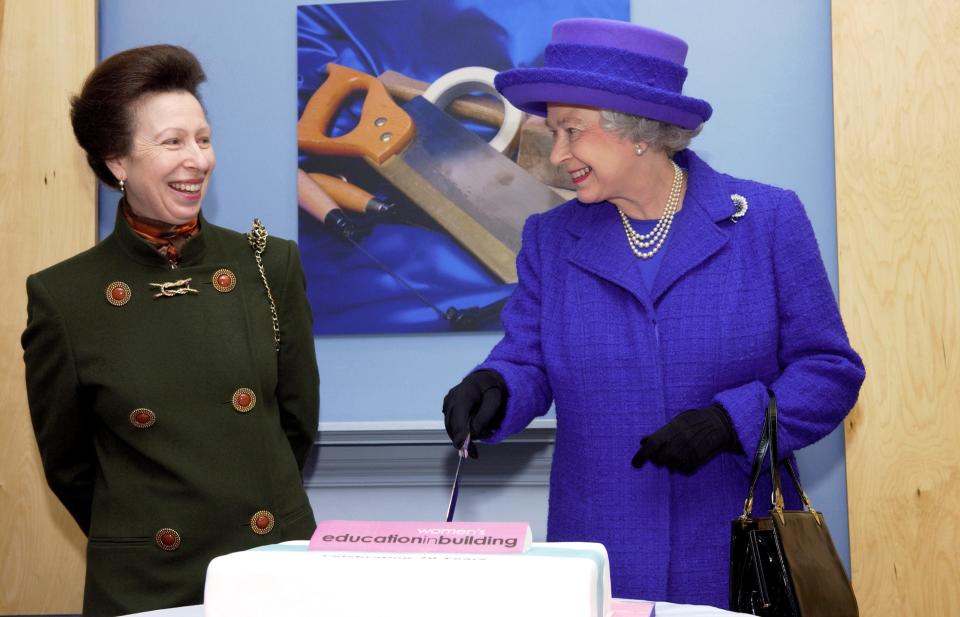 Queen Elizabeth II and Princess Anne visit the Offices of Women's Education in Building in 2004.