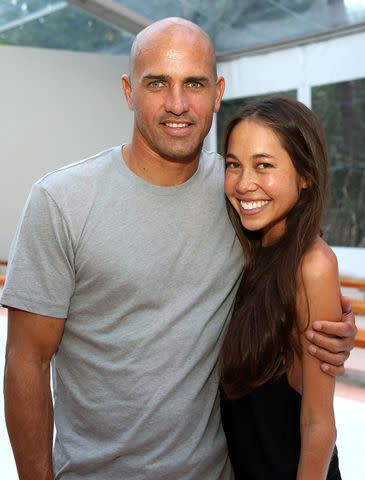 <p>Aaron Davidson/Getty</p> Kelly Slater and designer Kalani Miler on July 19, 2014 in Miami, Florida.