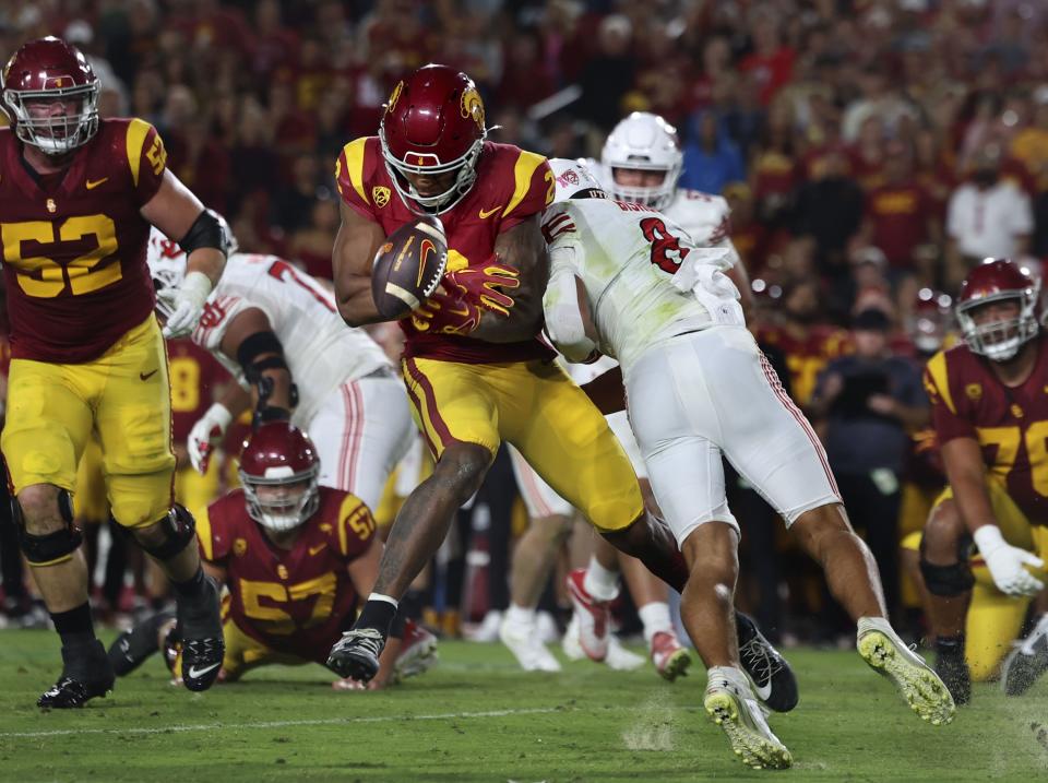 Utah Utes safety Cole Bishop (8) hits USC Trojans wide receiver Brenden Rice (2) at the Los Angeles Memorial Coliseum on Saturday, Oct. 21, 2023. | Laura Seitz, Deseret News