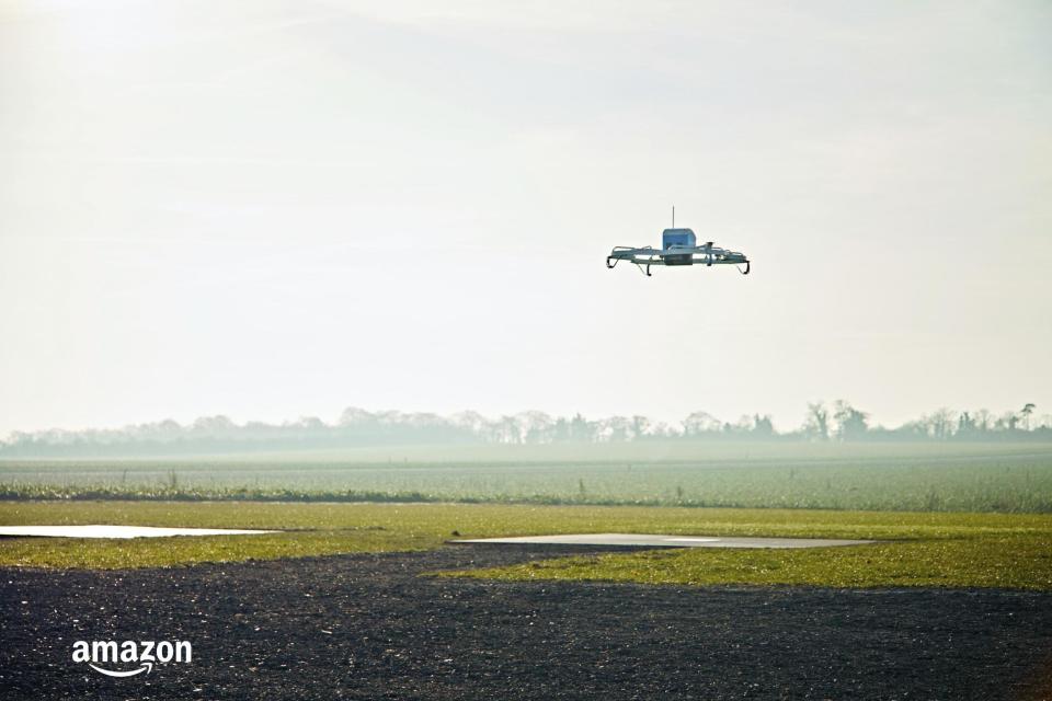 The e-retailer has been testing drone deliveries from its facility in Cambridgeshire (AP)