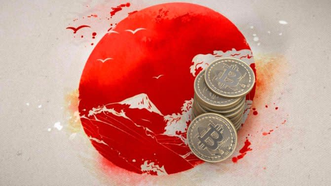 Japanische Flagge und Bitcoin Münzen