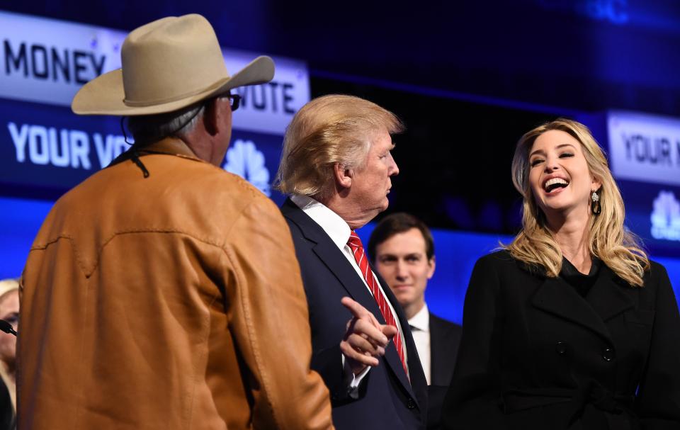 Republican Presidential hopeful Donald Trump (C) gestures as his daughter Ivanka Trump (R) laughs after the CNBC Republican Presidential Debate, October 28, 2015 at the Coors Event Center at the University of Colorado in Boulder, Colorado. AFP PHOTO/ ROBYN BECK        (Photo credit should read ROBYN BECK/AFP/Getty Images)