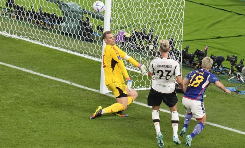 Takuma Asano scores Japan’s winner in Germany’s opening game