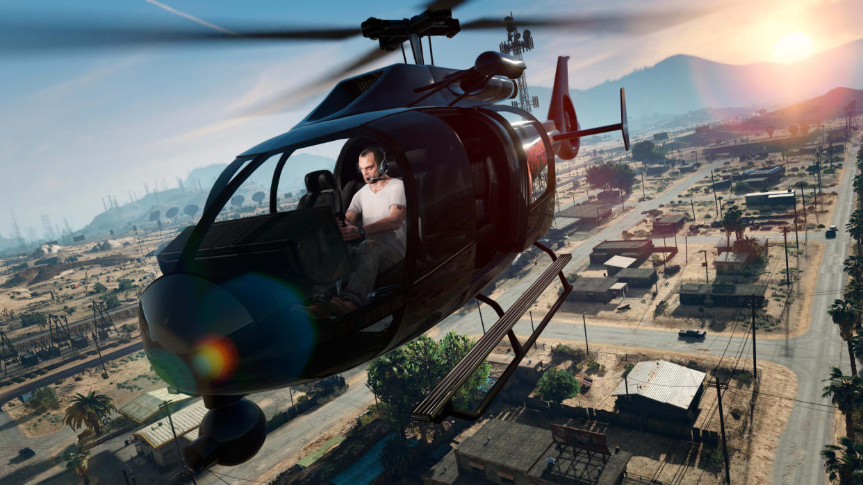  GTA 5 cheats — Trevor, one of GTA 5's protagonists, piloting a helicopter. 