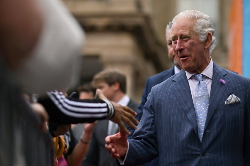 FILE - Britain's Prince Charles visits the Festival Site at Victoria Square before the opening ceremony of the Commonwealth Games, in Birmingham, England, Thursday July 28, 2022. Britain's Prince Charles is facing more questions over his charities after a newspaper reported that one of his funds accepted a 1 million-pound ($1.2 million) donation from relatives of Osama bin Laden. The Sunday Times reported that the Prince of Wales's Charitable Fund received the money in 2013 from Bakr bin Laden and his brother Shafiq. (Ben Stansall/Pool photo via AP, File)