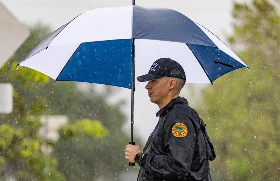 City of Miami police officer Ryan Dreseris helps direct traffic before the start of an event at the Bay of Pigs Memorial Park on Wednesday, April 12, 2023, in Miami, Fla. District 4 Commissioner Manolo Reyes unveiled a new monument to honor the Cubans who participated in the Bay of Pigs Invasion and showed improvements made to the park.