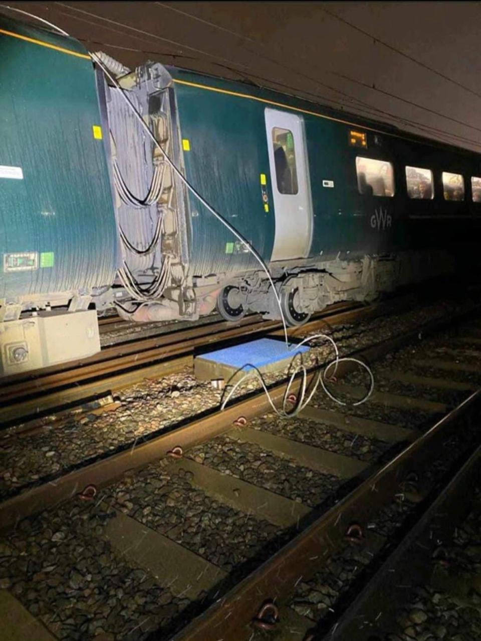 The damaged overhead electric cables in the Ladbroke Grove area of west London, which caused the delays (PA)