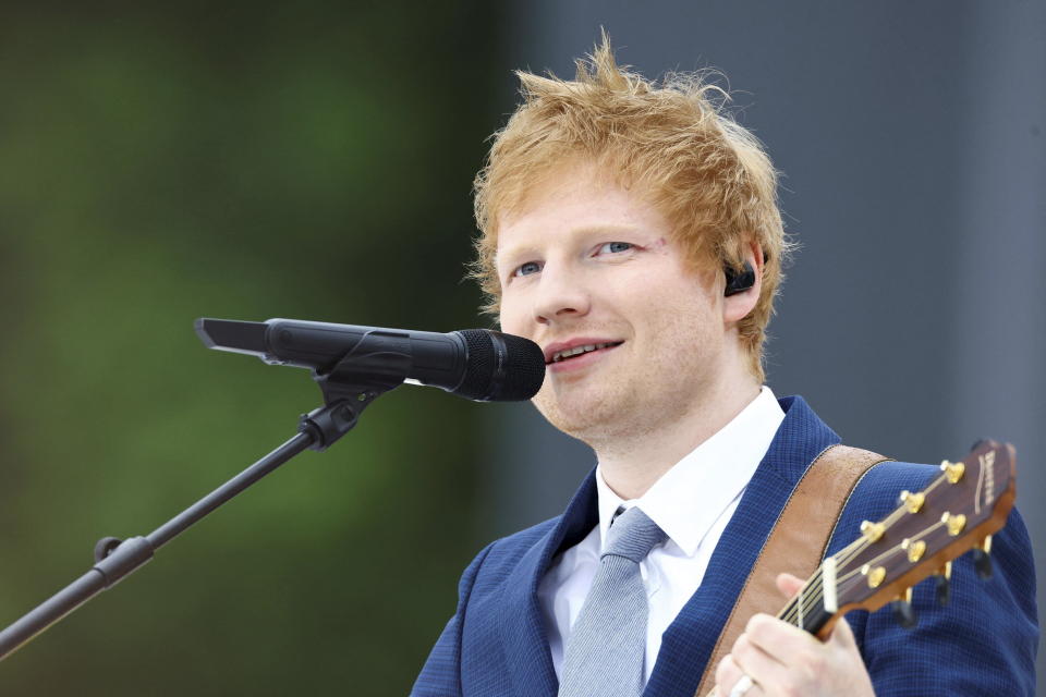 FILE - British singer Ed Sheeran performs during the Platinum Jubilee Pageant, in London on June 5, 2022. Sheeran and Lizzo are among the headliners at this year's New Orleans Jazz & Heritage Festival, which takes place over two weekends beginning April 28. (Hannah McKay/Pool Photo via AP, File)