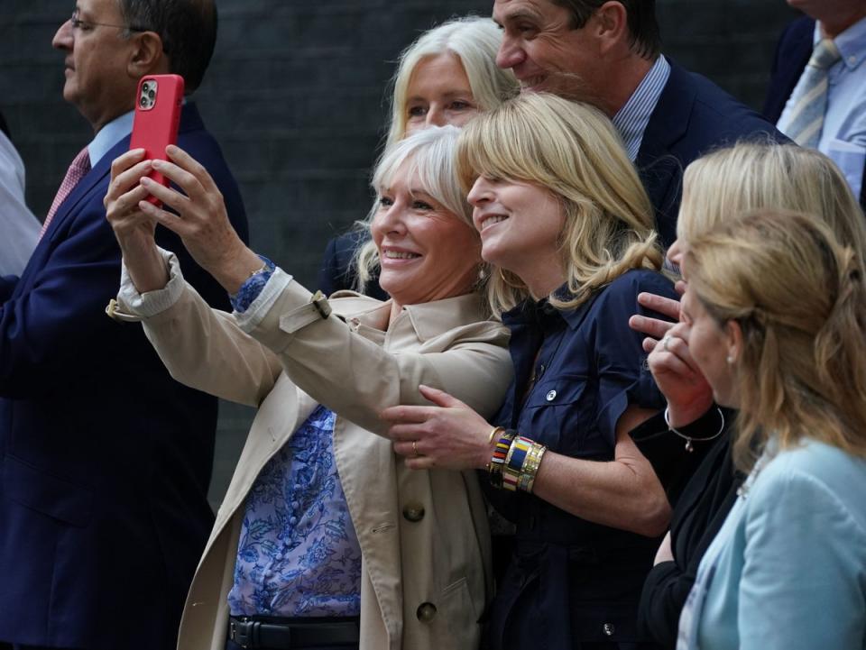 Nadine Dorries and Rachel Johnson outside 10 Downing Street, London, before outgoing Prime Minister Boris Johnson departs for Balmoral for an audience with Queen Elizabeth II to formally resign as Prime Minister. (PA)