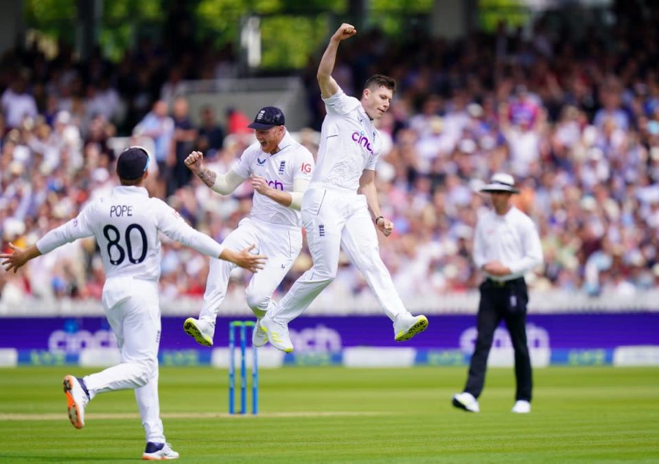 Matthew Potts, right, and Ben Stokes, centre, celebrate the wicket of New Zealand captain Kane Williamson (Adam Davy/PA) (PA Wire)