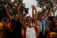 <p>People celebrate after the Catalan regional parliament declares the independence from Spain in Barcelona, Spain, Oct. 27, 2017.<br> (Photo: Juan Medina/Reuters) </p>
