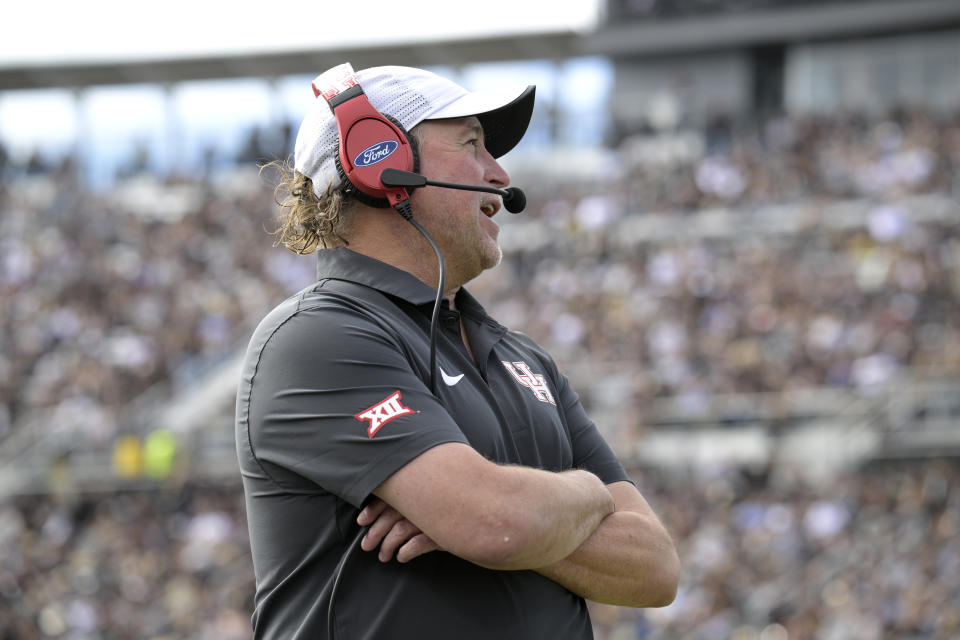 Houston head coach Dana Holgorsen watches from the sideline during the first half of an NCAA college football game against Central Florida, Saturday, Nov. 25, 2023, in Orlando, Fla. (AP Photo/Phelan M. Ebenhack)