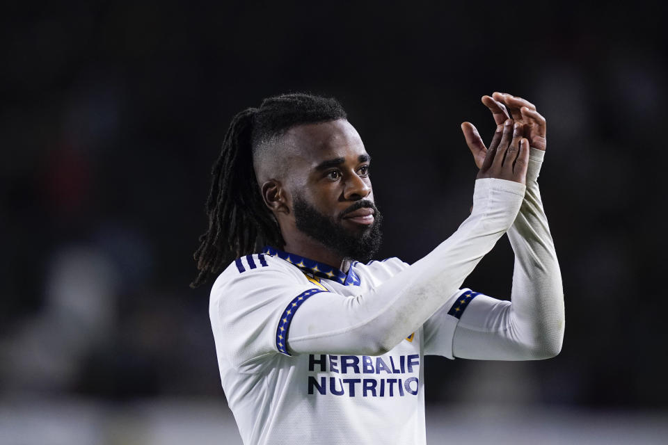 LA Galaxy defender Raheem Edwards greets the crowd after the team's 3-3 tie in an MLS soccer match against the Portland Timbers, Saturday, Sept. 30, 2023, in Carson, Calif. (AP Photo/Ryan Sun)