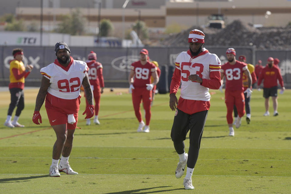 Kansas City Chiefs defensive end Neil Farrell (92) and defensive end BJ Thompson (53) run with teammates during practice Wednesday, Feb. 7, 2024 in Henderson, Nev. The Chiefs are scheduled to play the San Francisco 49ers in the NFL's Super Bowl 58 football game Sunday in Las Vegas. (AP Photo/Charlie Riedel