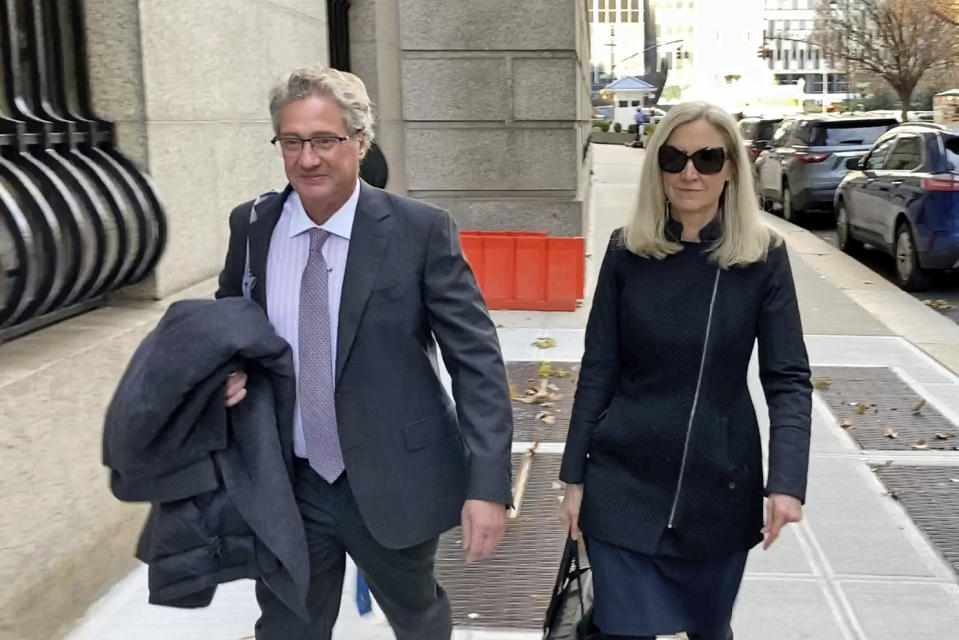 Ghislaine Maxwell's defense attorneys Laura Menninger and Jeffrey Pagliuca arrive at court in New York, on Friday, Dec. 3, 2021. The case against Maxwell stems from four now-adult women who said she recruited them into being sexually abused by Jeffrey Epstein. (AP Photo/Ted Shaffrey)