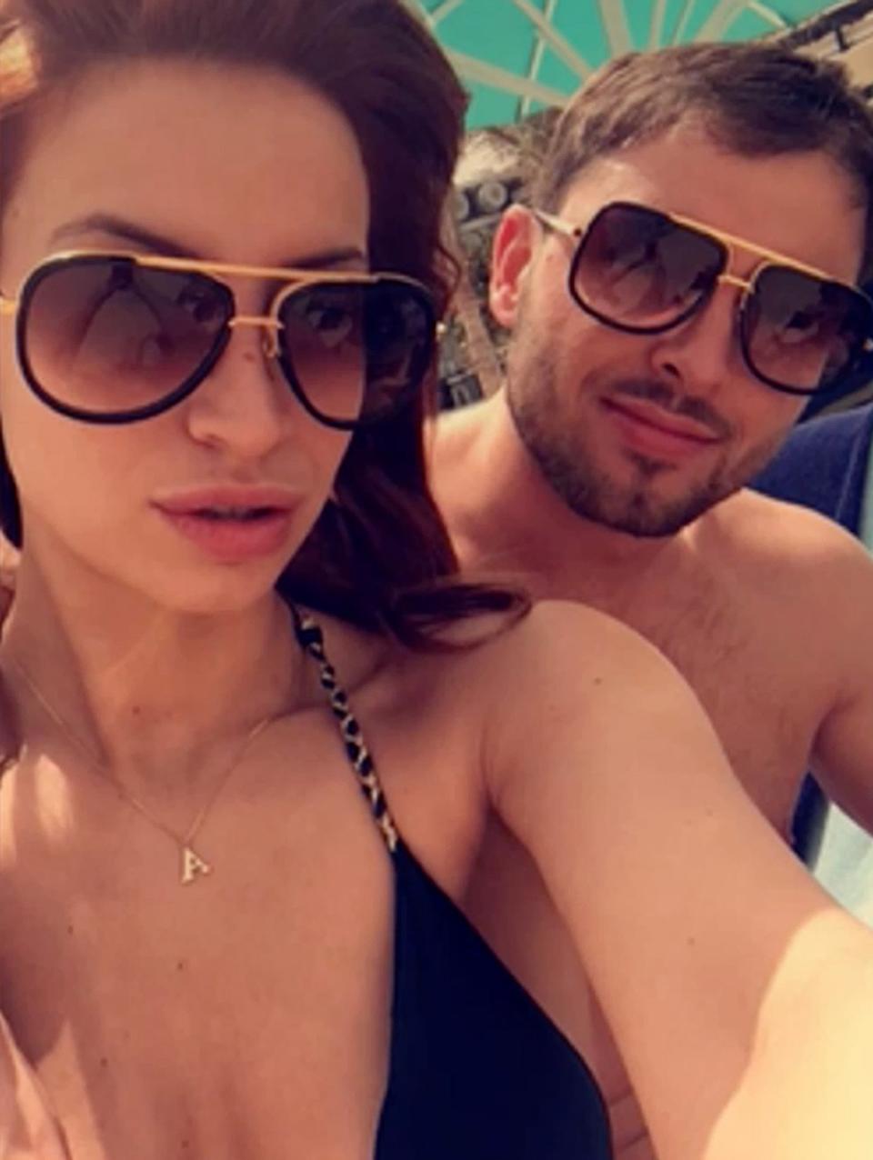 Ferne McCann and Arthur Collins pictured on holiday prior to his acid attack conviction. (REX)