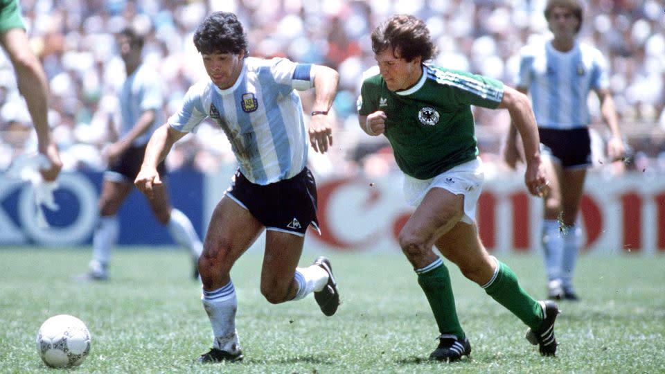 Maradona controls the ball during the 1986 World Cup final against West Germany. - Colorsport/Shutterstock