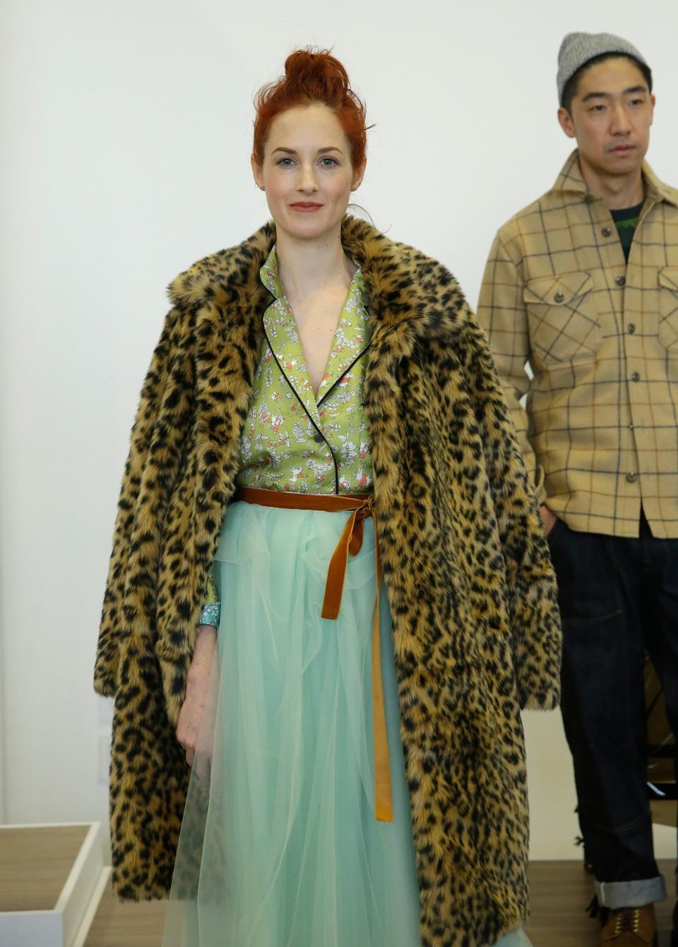 Taylor Tomasi Hill, aka VP creative/fashion director at Forty Five Ten and former fashion editor and street-style star, makes her model debut at J.Crew in a striking leopard coat.