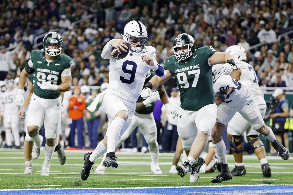 Penn State quarterback Beau Pribula scores a touchdown in the third quarter of MSU's 42-0 loss on Friday, Nov. 23, 2023, at Ford Field.