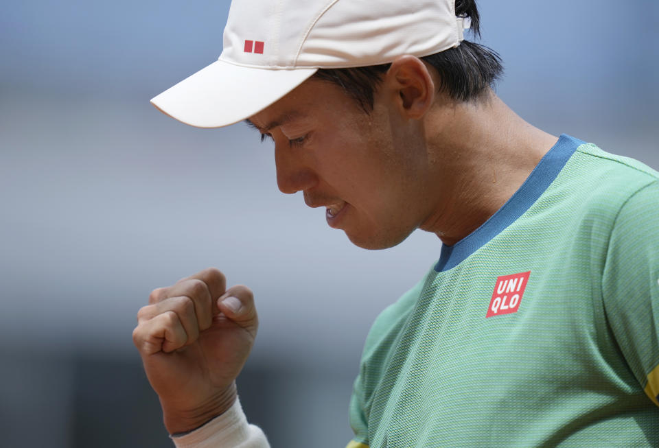 Japan's Kei Nishikori reacts as he wins a point against Russia's Karen Khachanov during their second round match on day four of the French Open tennis tournament at Roland Garros in Paris, France, Wednesday, June 2, 2021. (AP Photo/Thibault Camus)