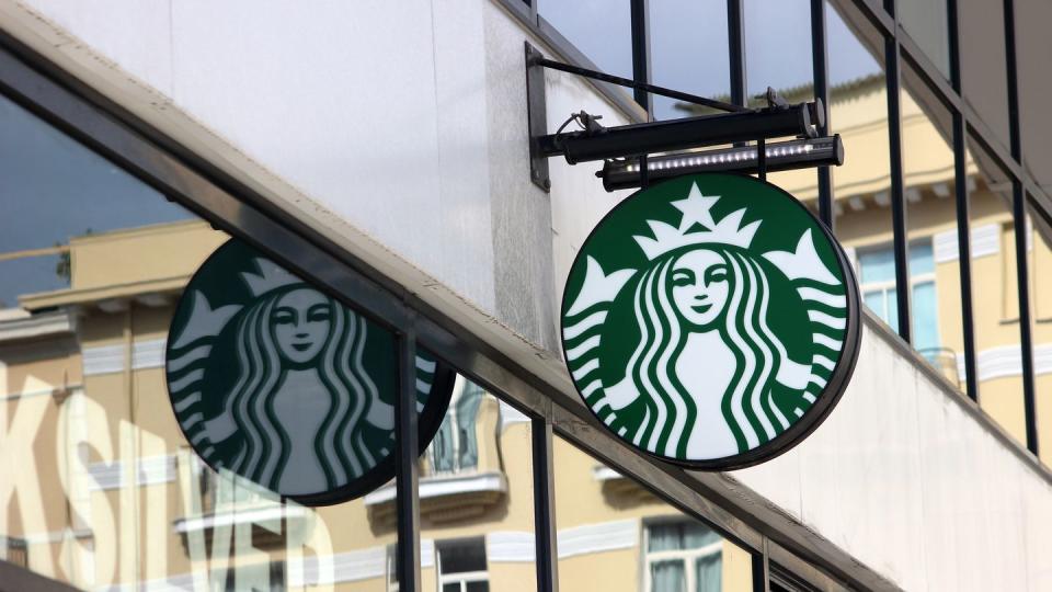 monte carlo, monaco march 9, 2016 starbucks sign is displayed at the facade of a starbucks store starbucks corporation is an american coffee company and the largest coffeehouse company in the world with 23,450 stores in 67 countries