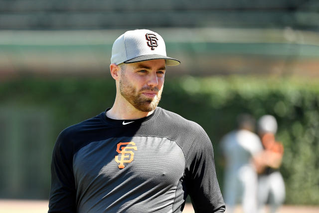 Sam Coonrod of the San Francisco Giants talks with Sam Coonrod on