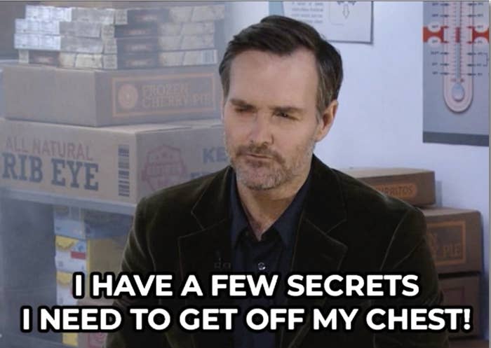 Man in a black jacket sits in front of boxes, caption reads "I HAVE A FEW SECRETS I NEED TO GET OFF MY CHEST!"