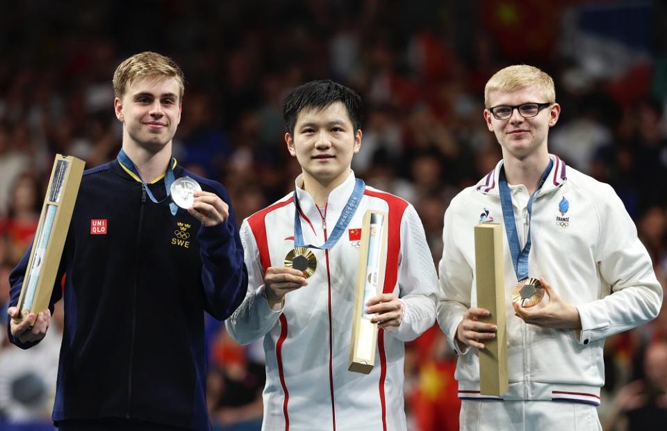 Fan Zhendong (au milieu) (Photo : Getty Images)