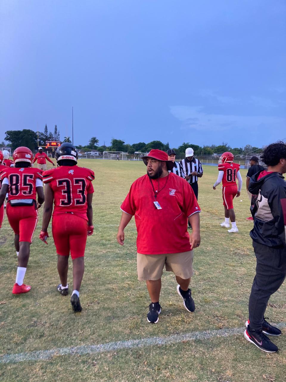 Santaluces head coach Hector Clavijo prepares his team to play against South Broward in spring football competition on Thursday in Lantana.