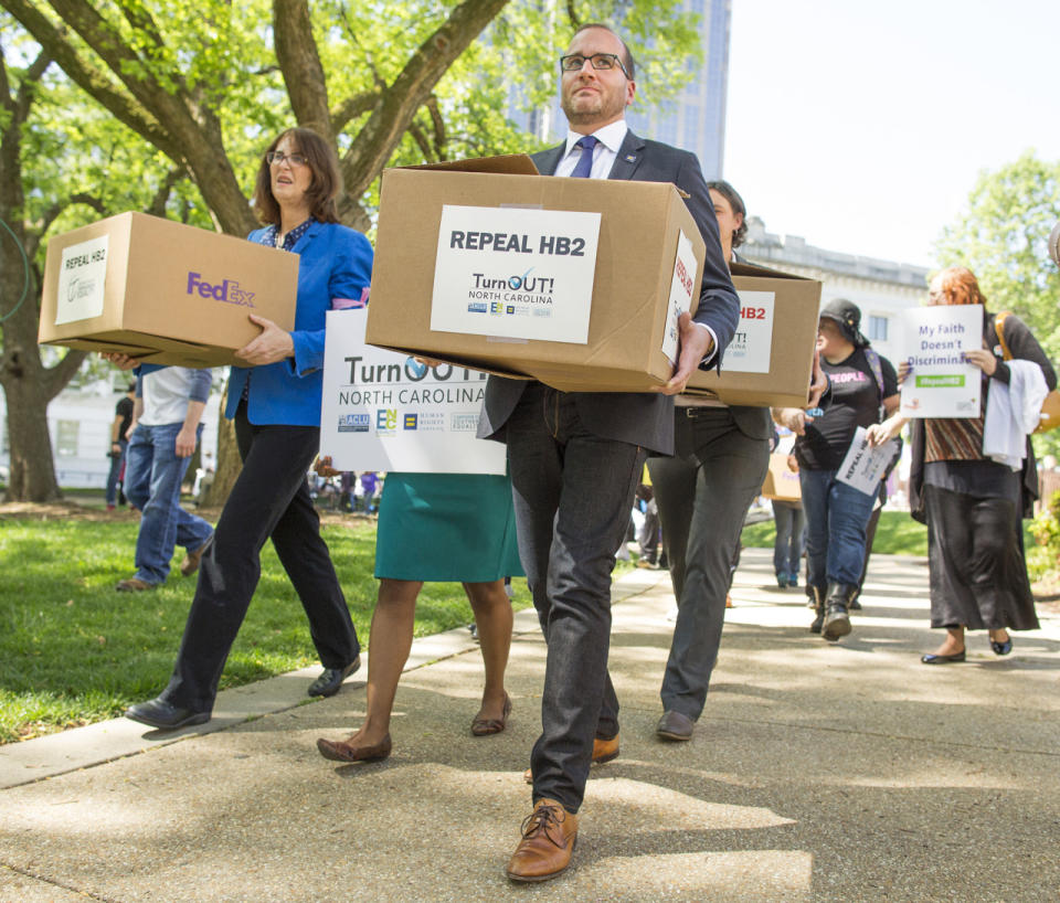 Chad Griffin delivers a box of petitions