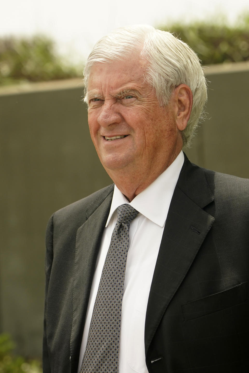 Mississippi Supreme Court Chief Justice Mike Randolph exits the Thad Cochran United States Courthouse in Jackson, Miss., Monday, May 22, 2023, after a day in federal court where a judge heard arguments about a Mississippi law that would create a court system with judges who would be appointed rather than elected. (AP Photo/Rogelio V. Solis)