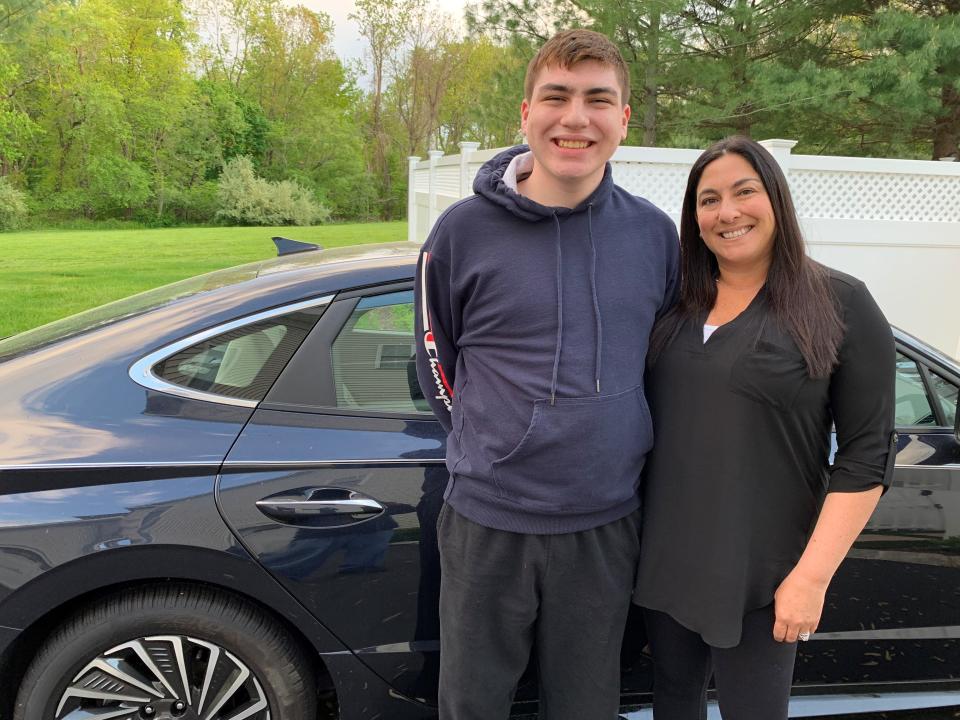 Jay Fisher with mom Deb Fisher in Marlboro.