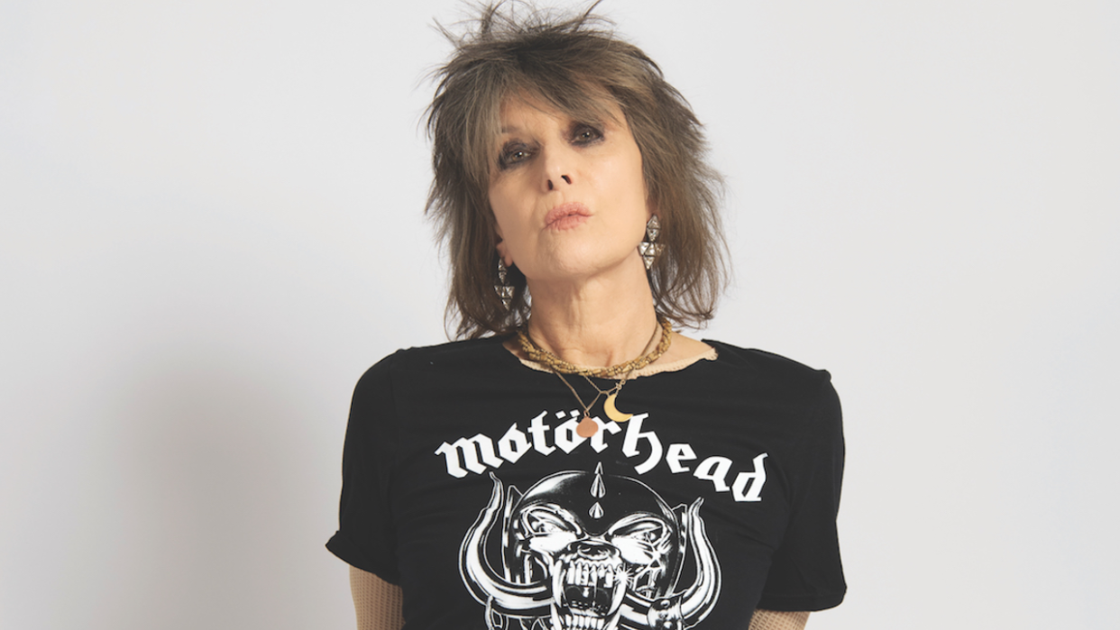  Chrissie Hynde, the lead singer with Pretenders, stares into the camera wearing a Motorhead T-shirt. 