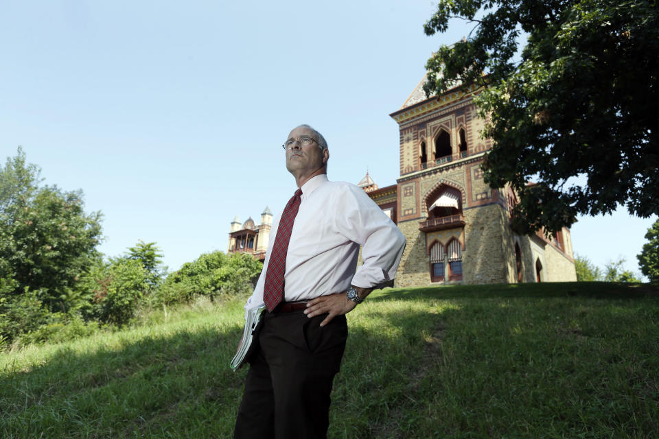 In this Wednesday, Aug. 21, 2013, photo, Jeffrey Anzevino poses on the grounds of the Olana State Historic Site in Greenport, N.Y. Anzevino is the director of land use advocacy for Scenic Hudson. (AP Photo/Mike Groll)